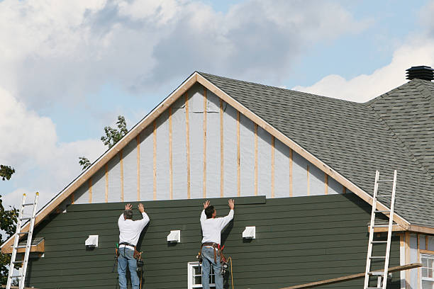 Professional Storm Damage Siding Repair technician working in Derry, PA